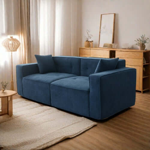 Modern low profile box arm memory foam sofa in stylish blue upholstery, perfect for contemporary living rooms.