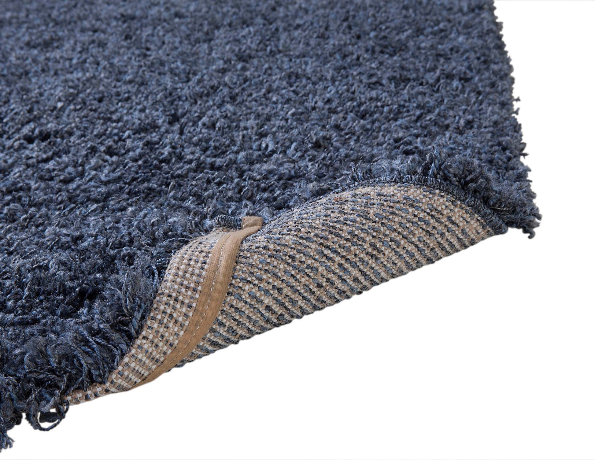 Close-up of the Slate Blue Rectangular Shag Area Rug showcasing soft texture and quality backing.