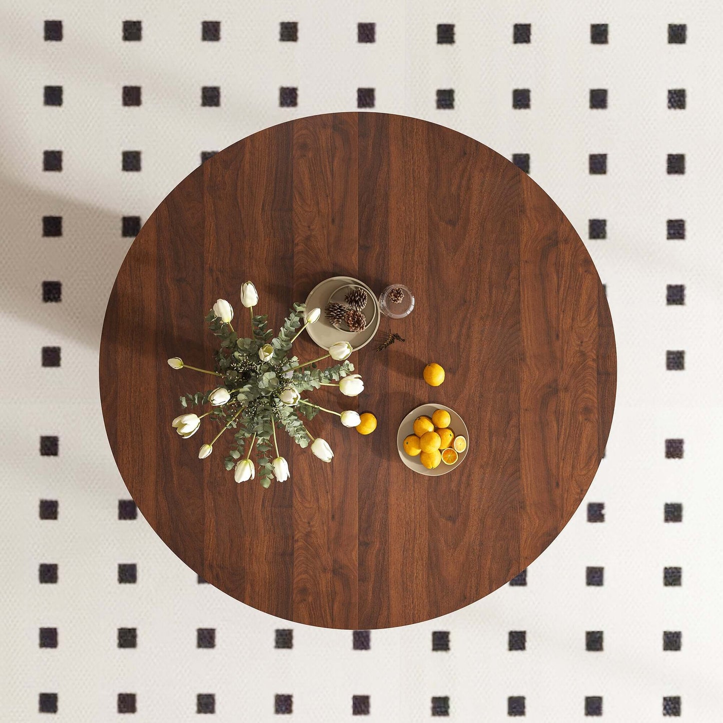 47-Inch Round Walnut Dining Table for 4 – Modern Farmhouse Kitchen Table with Wood Strip Base, overhead view with flowers and fruit.