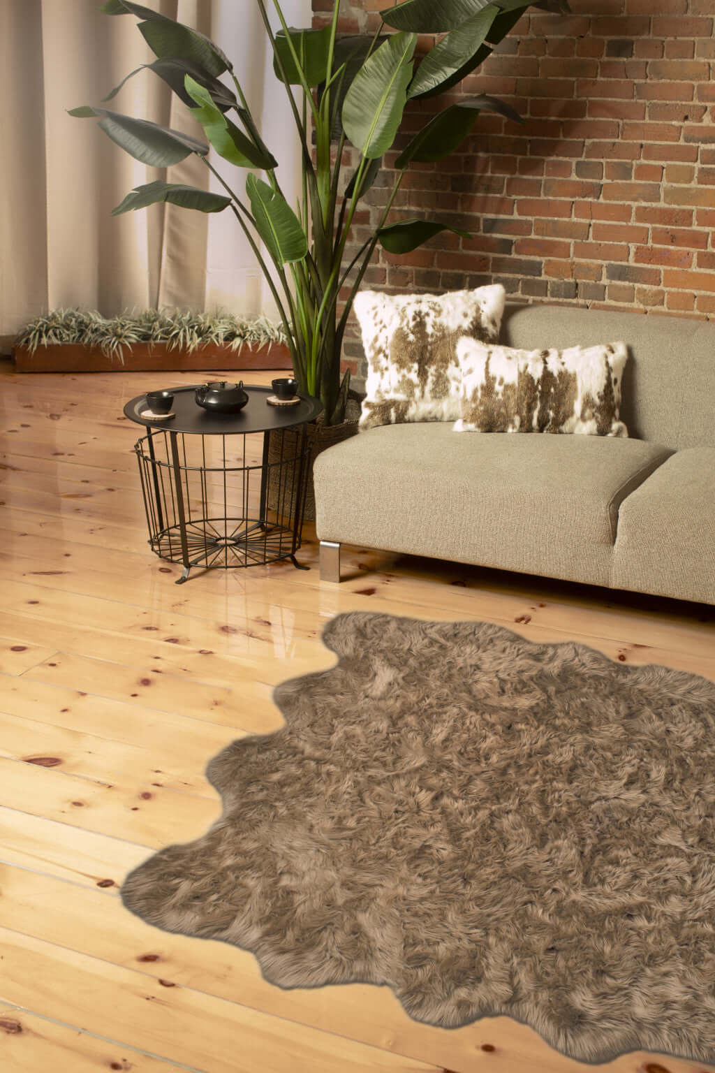 Cozy living room featuring a scalloped faux fur shag rug and modern decor for elegant comfort.