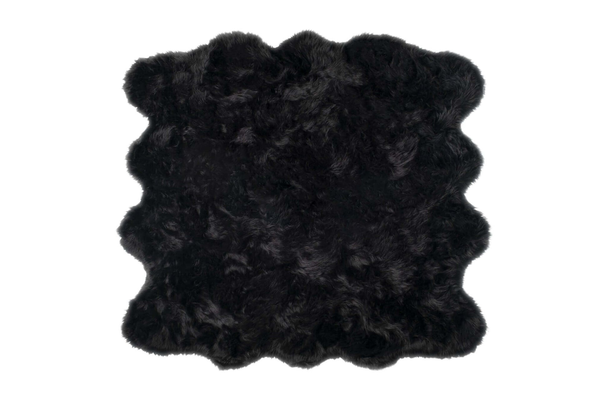 Scalloped faux fur square shag rug in black, 6' x 6', offering softness and style for any modern space.