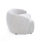90" Off White Fabric Sofa With Black Legs shown from the side, highlighting its curved design and textured material.