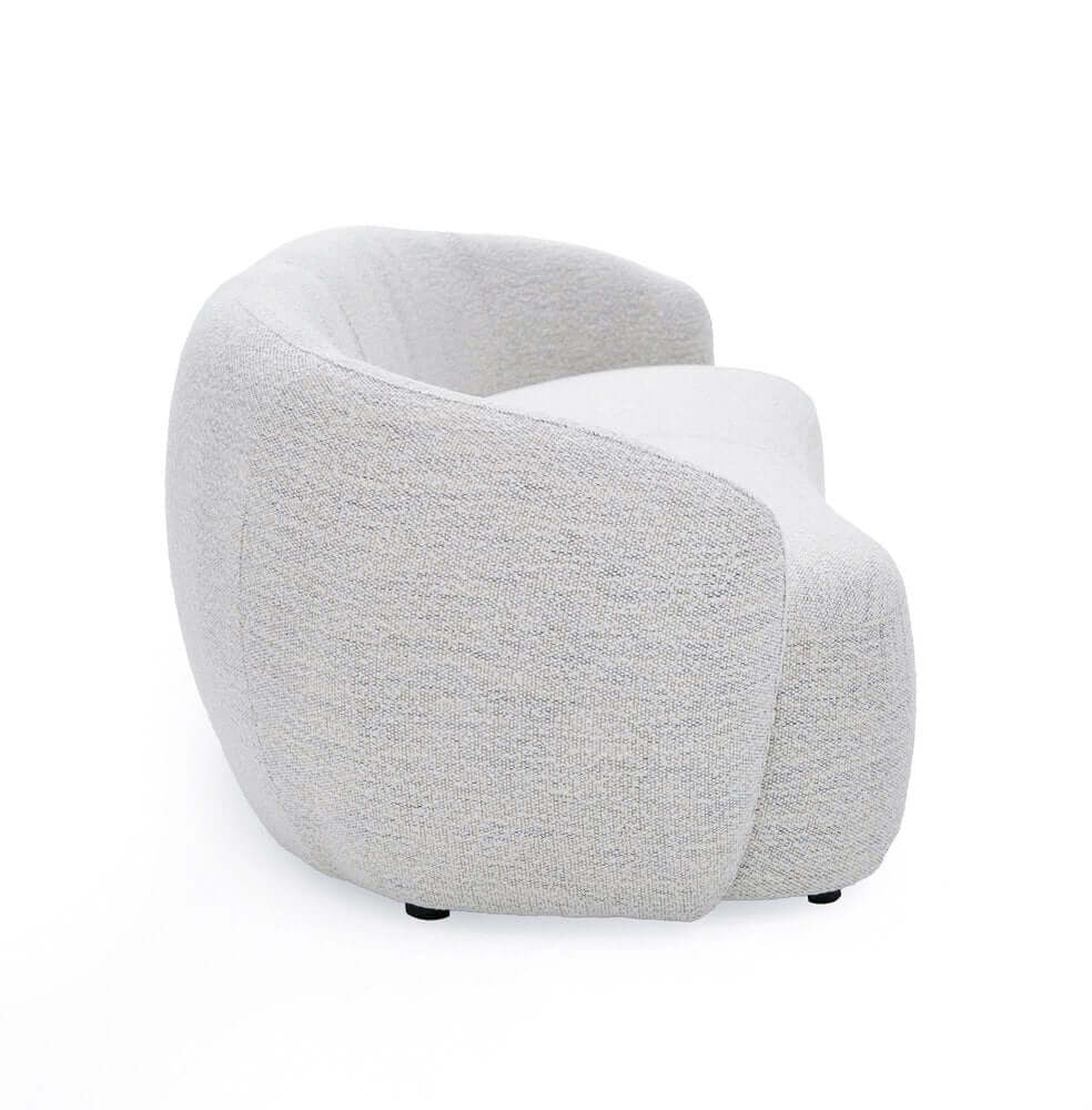 90" Off White Fabric Sofa With Black Legs shown from the side, highlighting its curved design and textured material.