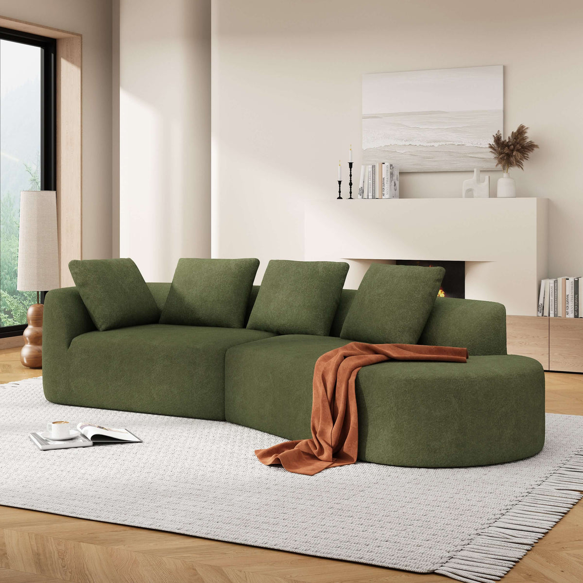 Modern Low Profile Modular Curved Foam Sofa 116' (4 Colors) in green fabric with pillows on a rug in a living room.