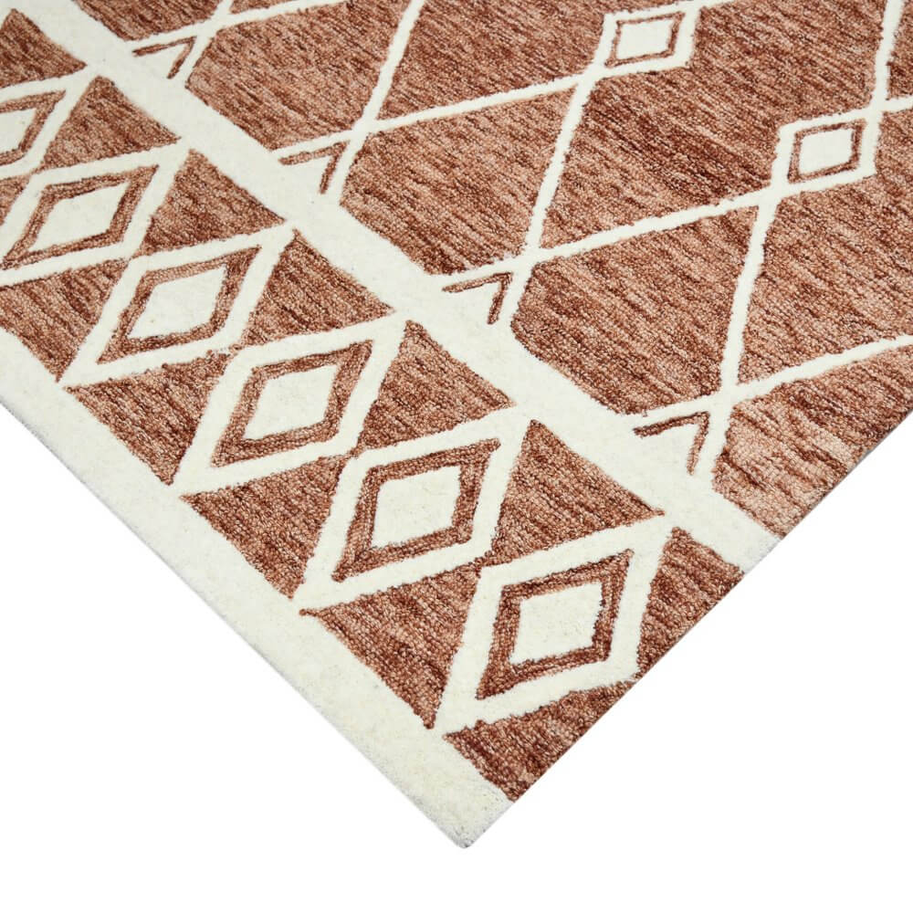 Rust And Ivory Wool Argyle Hand Hooked Area Rug | 9' x 13' close-up showing pattern and texture.