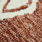 Close-up texture of Rust And Ivory Wool Argyle Hand Hooked Area Rug | 9' x 13' showcasing wool fibers.