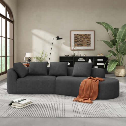 Modern Low Profile Modular Curved Foam Sofa 116' (4 Colors) in stylish living room setting with natural light.