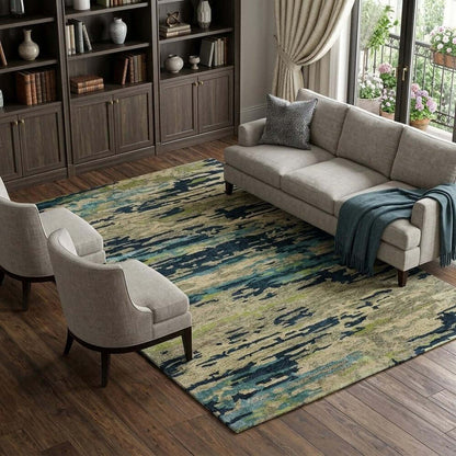Sand And Green Wool Abstract Hand Tufted Area Rug | 9' x 13' displayed in a cozy living room setting.