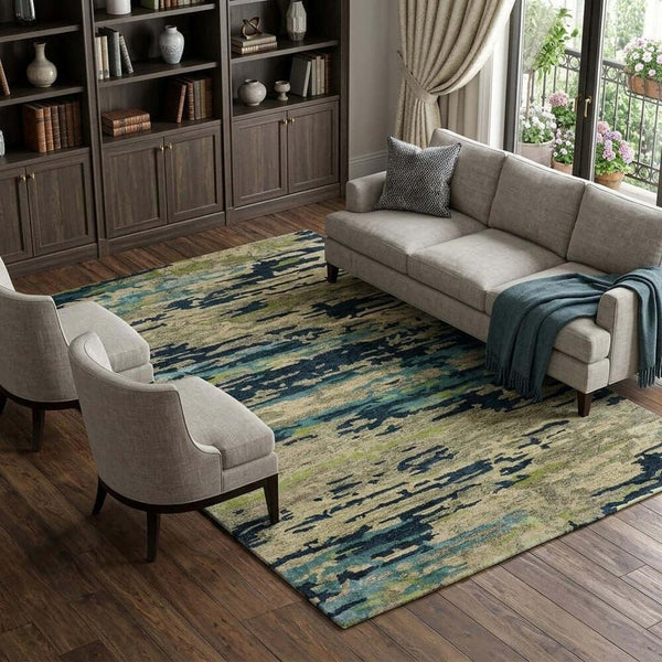 Sand And Green Wool Abstract Hand Tufted Area Rug | 9' x 13' displayed in a cozy living room setting.