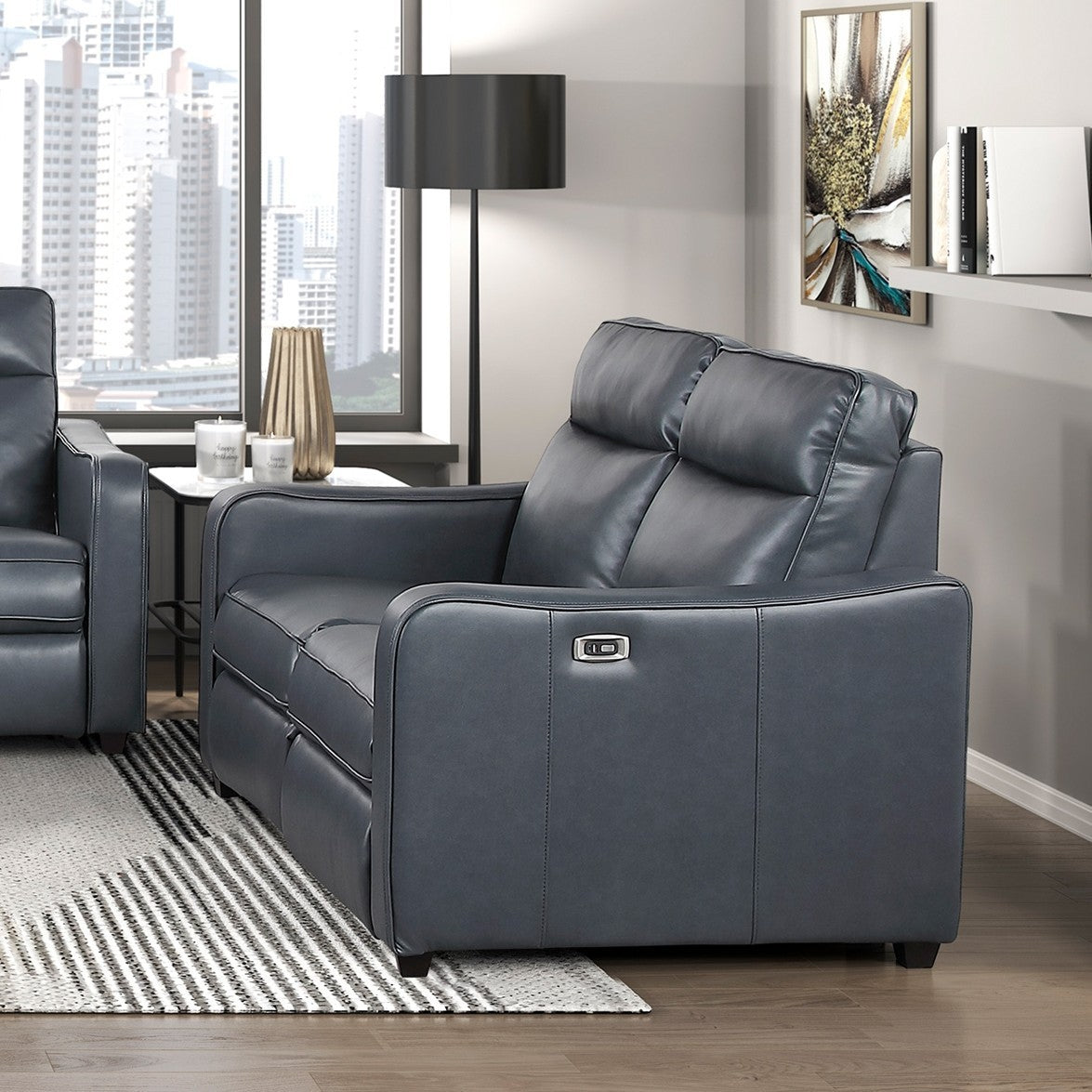 Haddon power reclining sofa, loveseat and chair set in navy faux leather