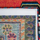 Red And Orange Tribal Washable Area Rug With UV Protection Area Rug | 9' x 13' close-up showing textured design and vibrant colors.
