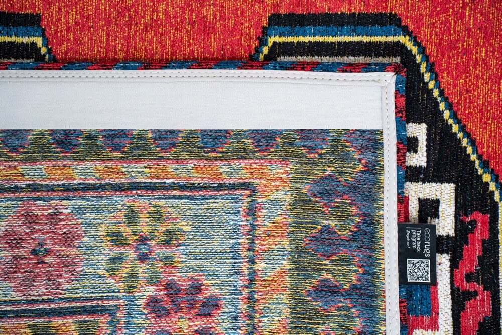 Red And Orange Tribal Washable Area Rug With UV Protection Area Rug | 9' x 13' close-up showing textured design and vibrant colors.