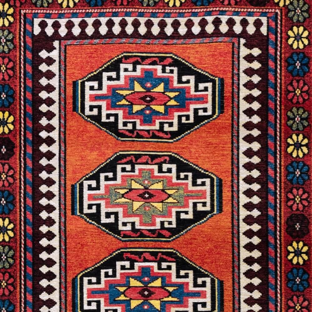 Red And Orange Tribal Washable Area Rug With UV Protection Area Rug | 9' x 13' featuring a bold tribal pattern.