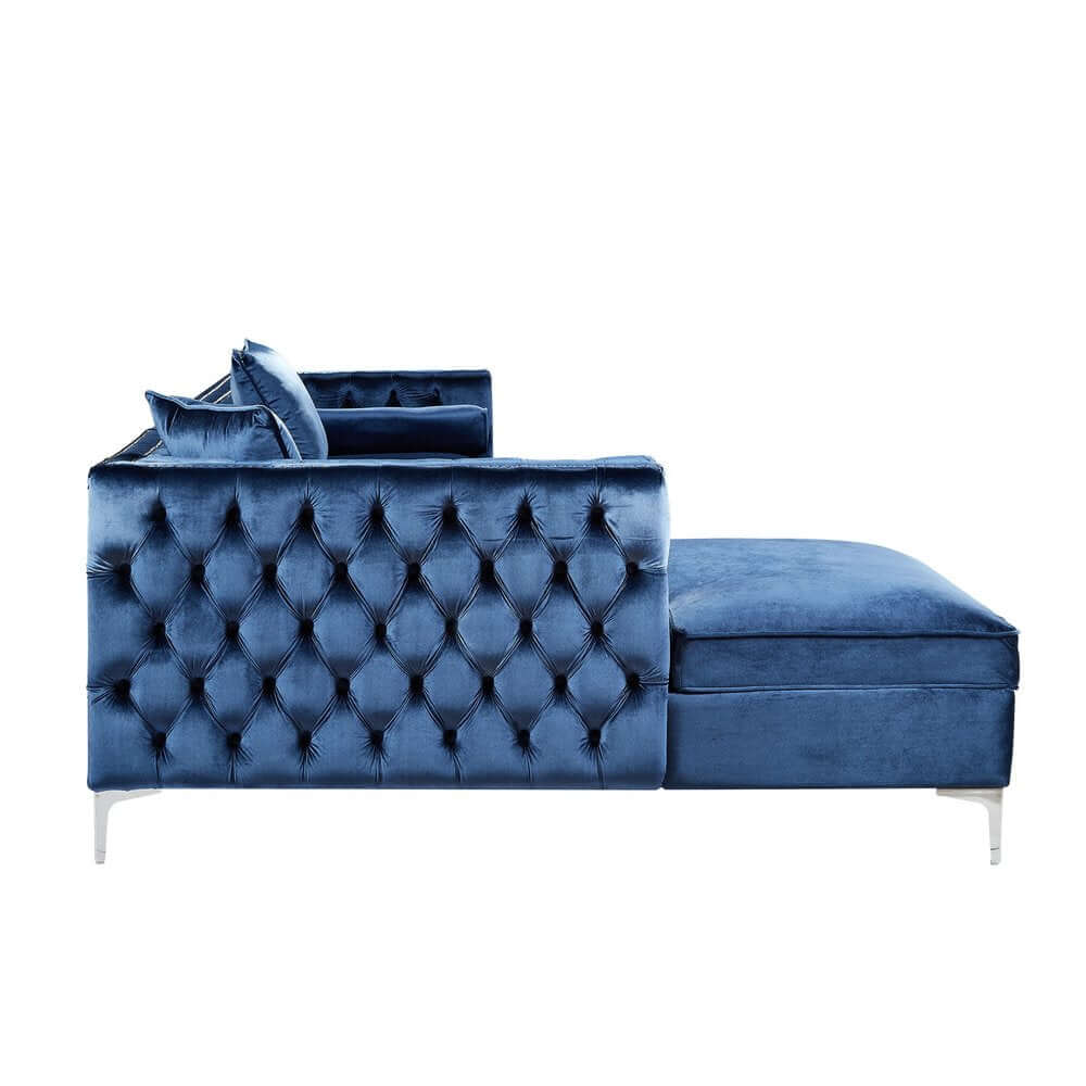 Navy Blue Velvet Rectangular Sofa and Chaise Sectional And Toss Pillows with tufted detailing.