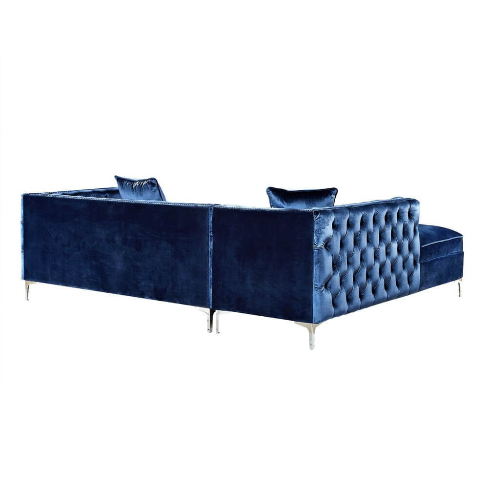 Navy Blue Velvet Rectangular Sofa and Chaise Sectional And Toss Pillows showcasing tufted design and metal legs.