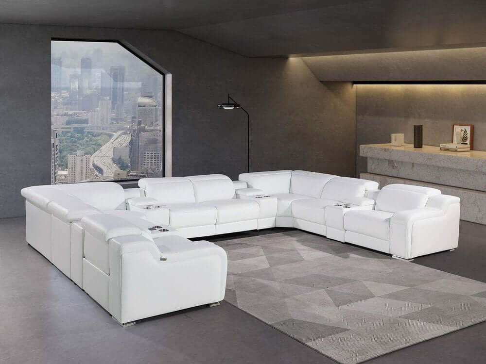White Italian Leather Power Reclining U Shaped Twelve Piece Corner Sectional With Console in modern living room setting.