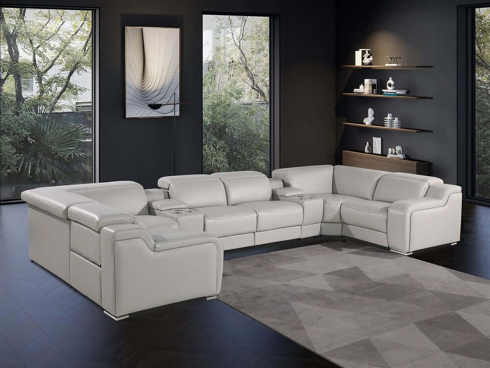 Light Gray Italian Leather Power Reclining U Shaped Eight Piece Corner Sectional With Console in a modern living room setting.