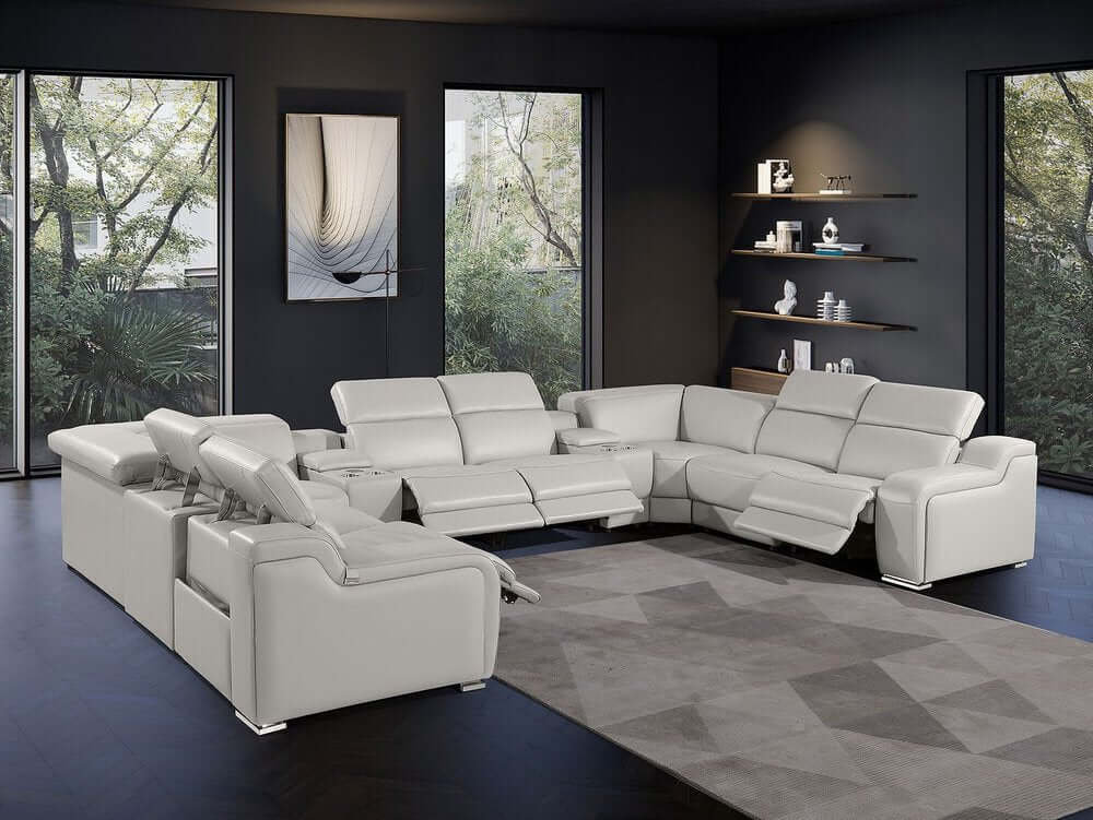 Light Gray Italian Leather Power Reclining U Shaped Ten Piece Corner Sectional With Console in modern living room setting.