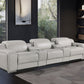 129" White Italian Leather Reclining USB Sofa in a modern living room setting.