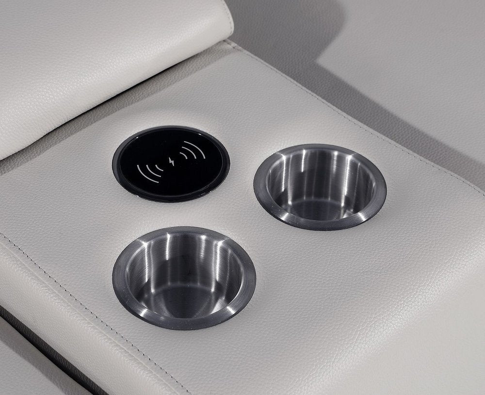 Detail of the USB and cup holders on the 129" White Italian Leather Reclining USB Sofa.