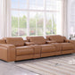 129" White Italian Leather Reclining USB Sofa in a stylish living room setting with large windows and elegant decor.