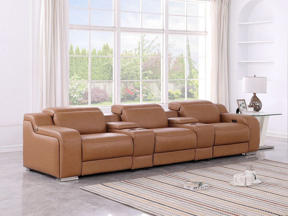 129" White Italian Leather Reclining USB Sofa in a stylish living room setting with large windows and elegant decor.