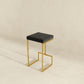 Joel Gold Velvet Bar Stool – Upholstered Backless Counter Stool with Metal Frame (Modern Glam Style) on a neutral background.