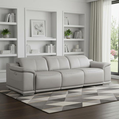 107" Light Gray Top Grain Leather Reclining USB Sofa in modern living room setting with stylish decor.