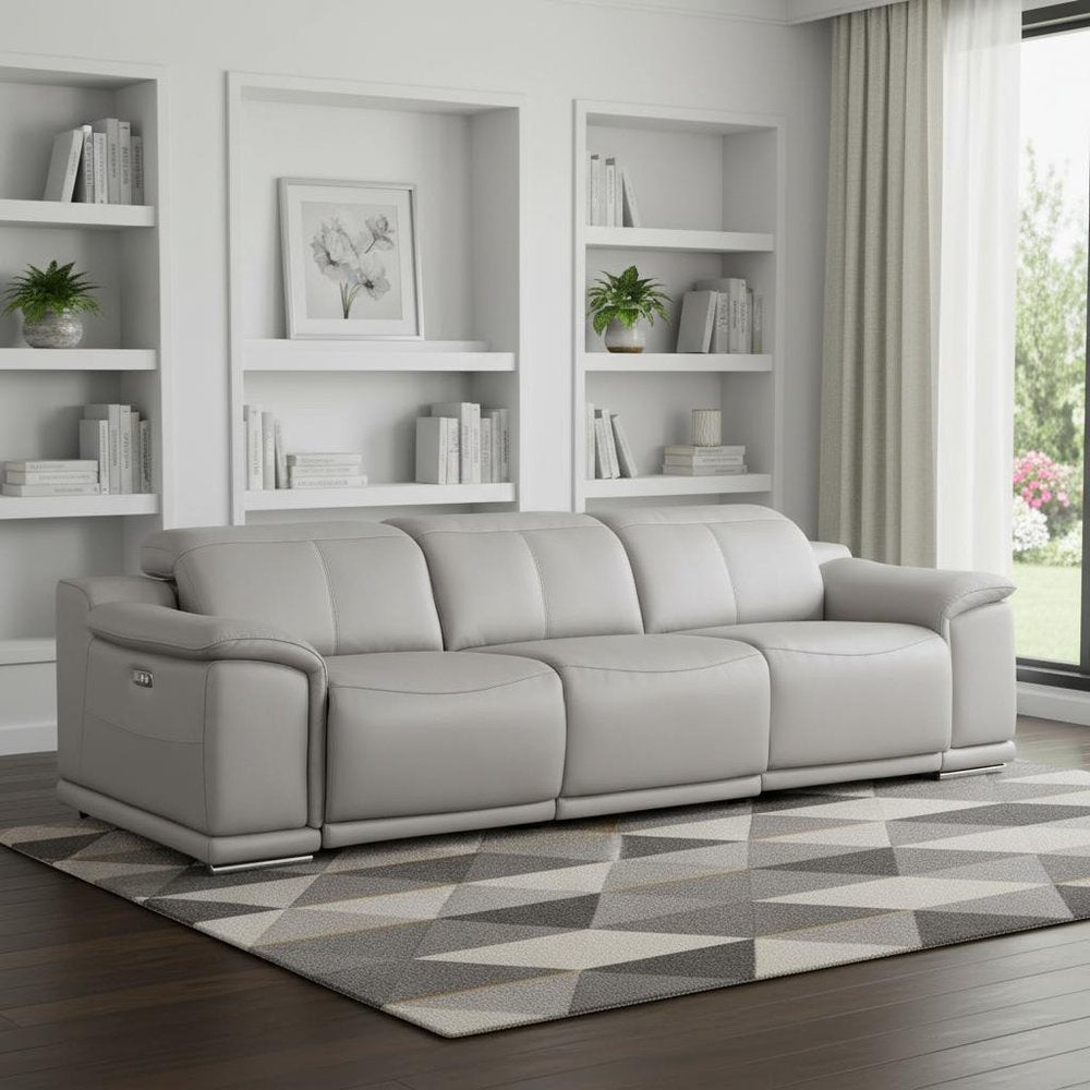 107" Light Gray Top Grain Leather Reclining USB Sofa in modern living room setting with stylish decor.