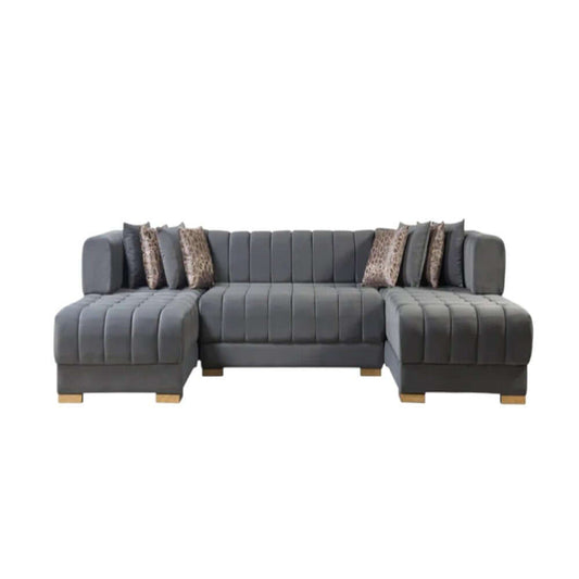 Gray Velvet U Shaped Three Piece Sofa and Chaise Sectional With Toss Pillows in a modern living room setting