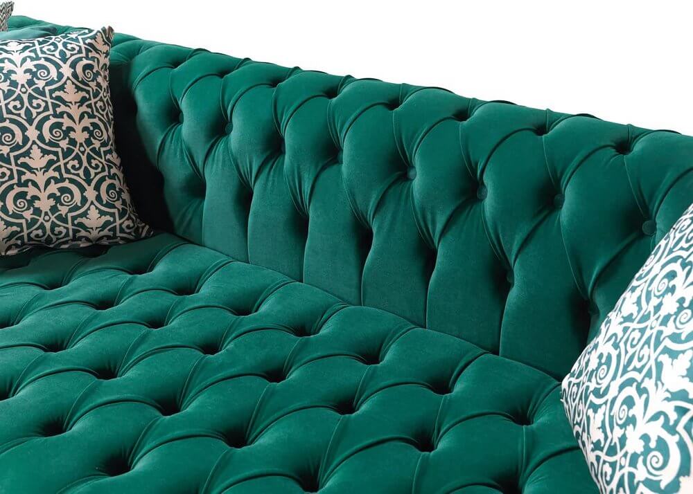 Green Velvet U Shaped Three Piece Sofa and Chaise Sectional With Toss Pillows close-up view of tufted design and decorative pillows.
