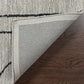 Close-up of Abbey Valetta handwoven wool area rug corner showcasing durable backing and textured surface.