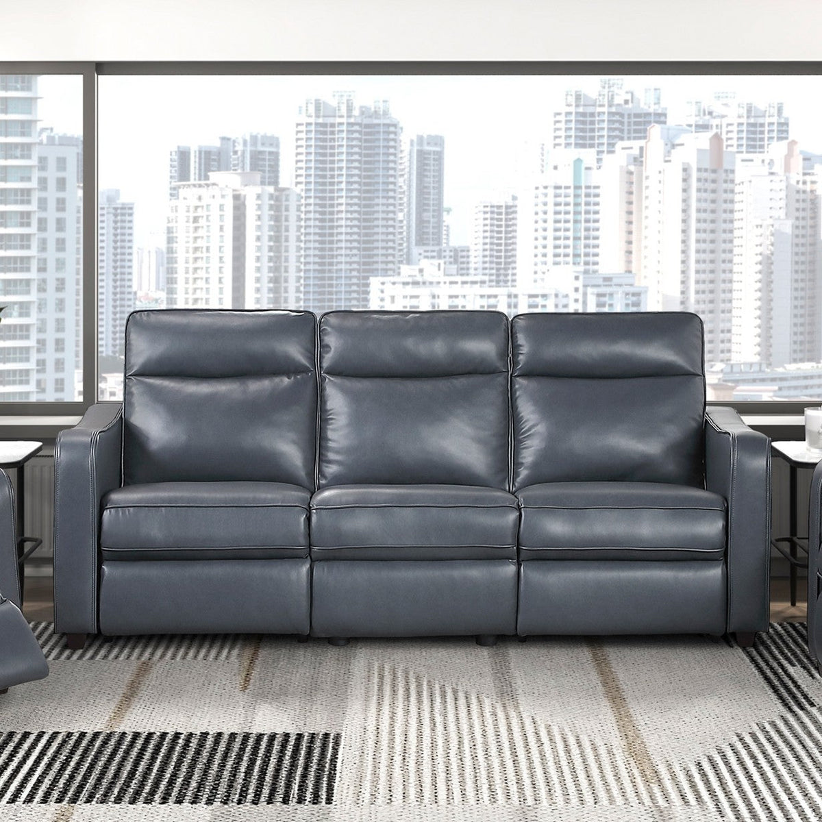 Haddon power reclining sofa, loveseat and chair set in navy faux leather