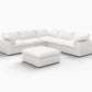 White Linen Blend Modular L Shaped Six Piece Corner Sectional with plush cushions and ottoman on a clean background.