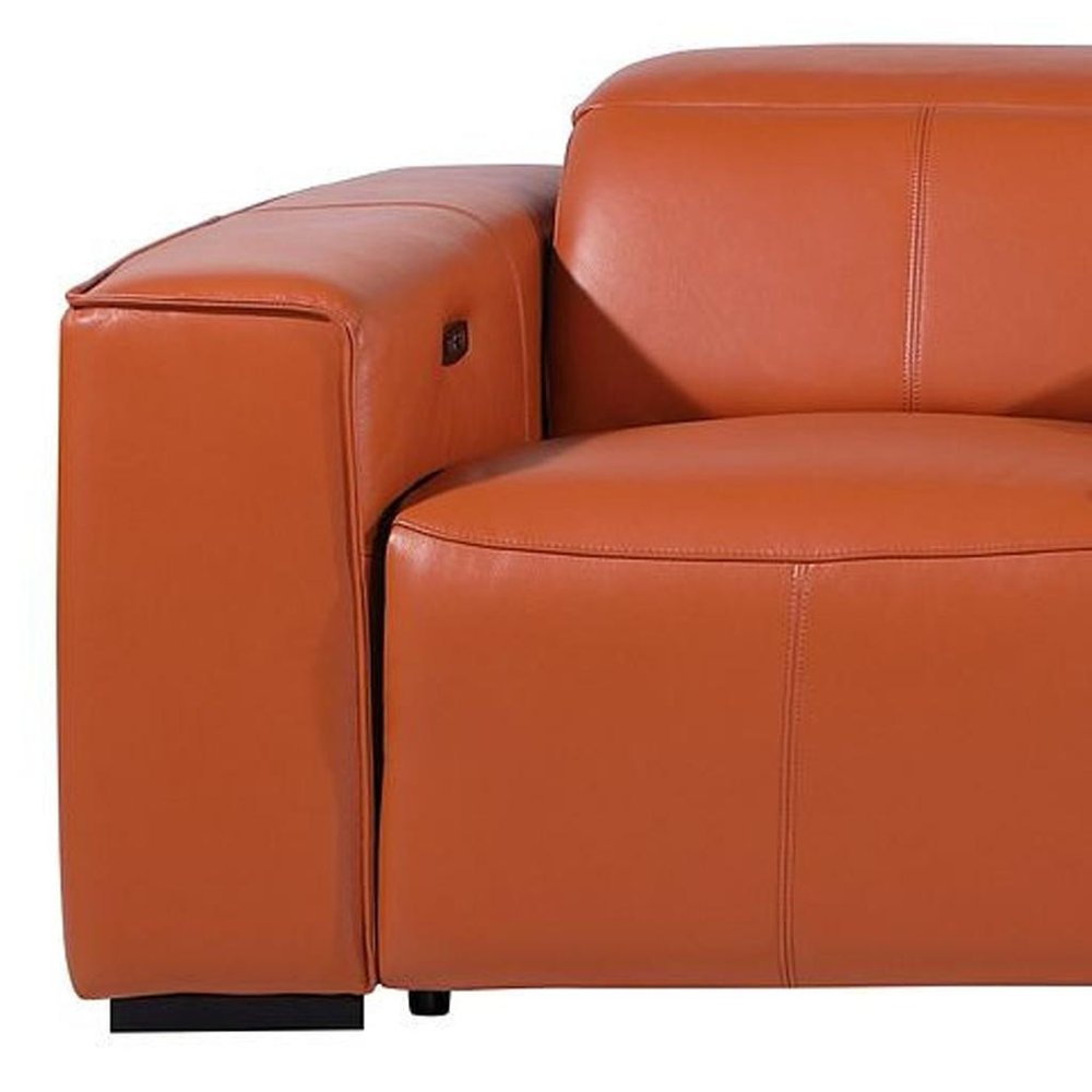 Close-up of the armrest of a 130" Black Top Grain Leather Reclining Metal USB Sofa in orange leather.