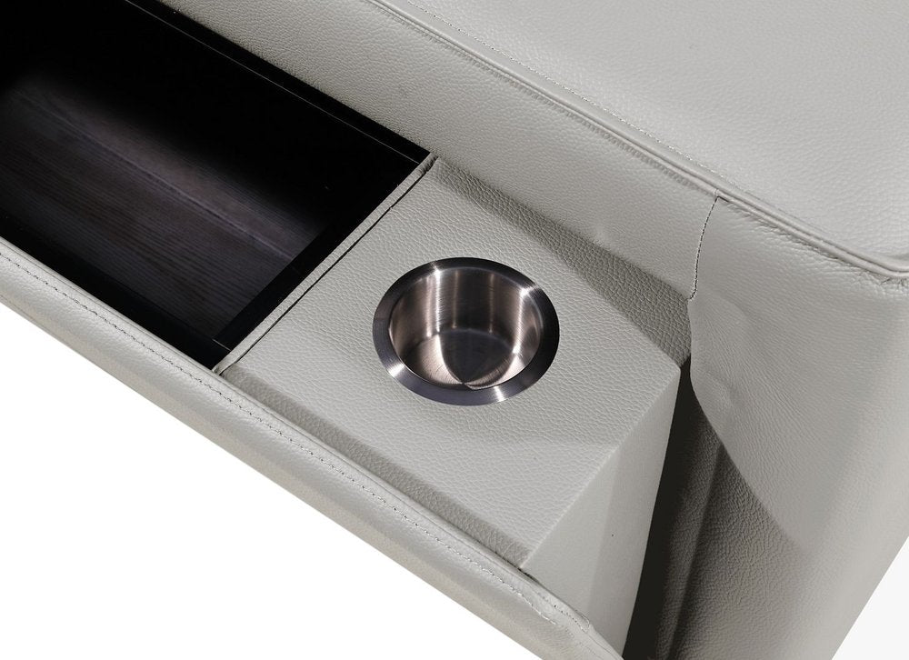 Detail of the armrest featuring a silver cup holder and storage on the 130" Black Top Grain Leather Reclining Metal USB Sofa.