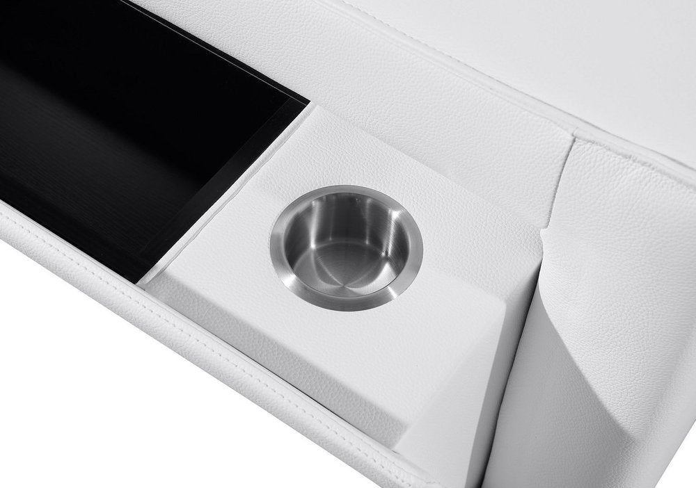 Detail of reclining sofa's built-in cup holder, showcasing sleek design and modern functionality.