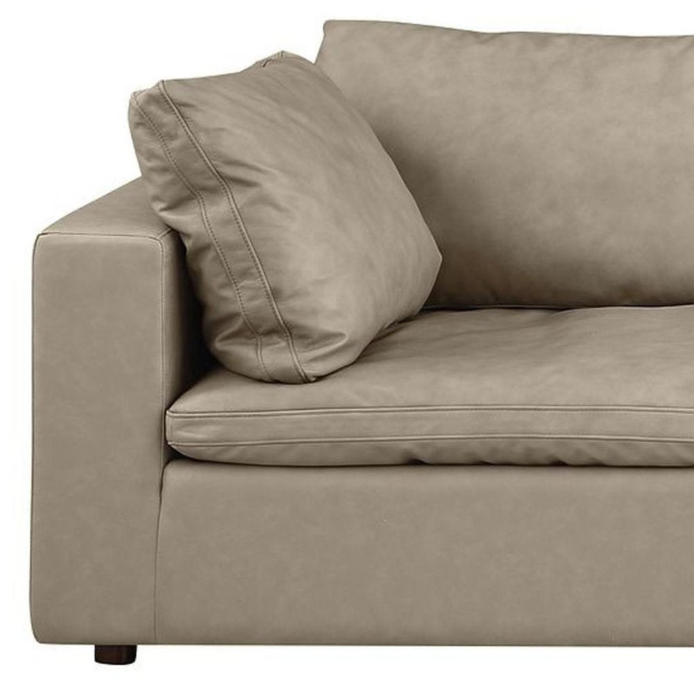 122" Beige Top Grain Leather Reclining Solid Wood Sofa with plush cushions for ultimate comfort.