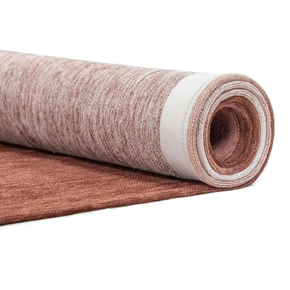 Red And White Abstract Washable Area Rug With UV Protection Area Rug | 9' x 13' rolled up showcasing texture and design.