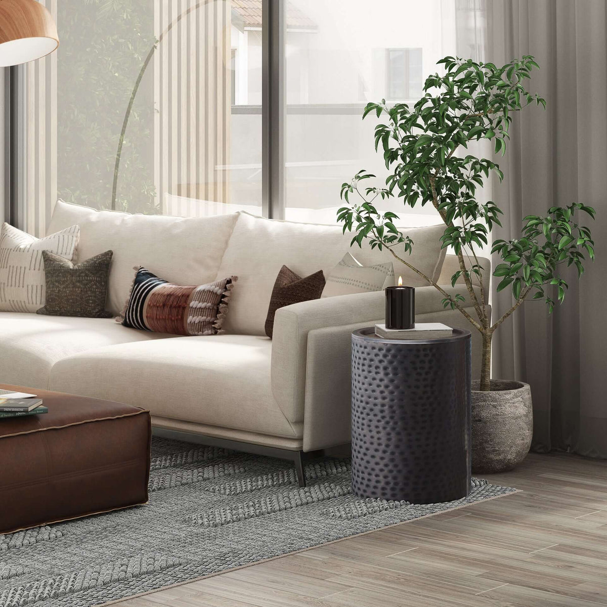 Corbin Hammered Antique Metal Cylindrical Side Table in rich antique copper finish, showcasing a hand-hammered texture.