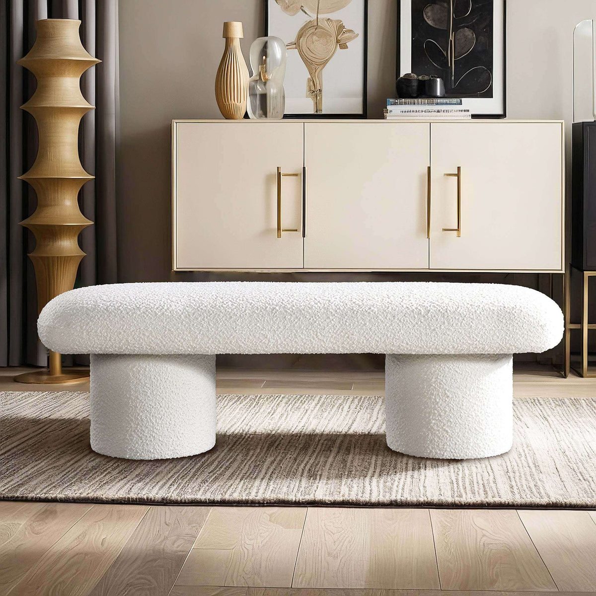 Randolph Ivory Boucle Bench 56' in modern living room with minimalist design and sleek cylindrical legs.