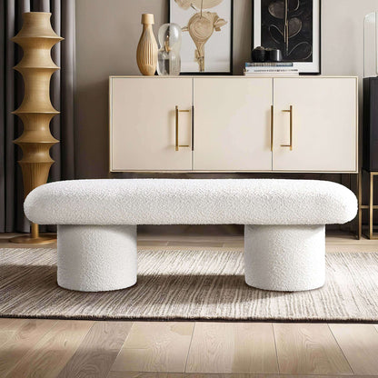 Randolph Ivory Boucle Bench 56' in modern living room with minimalist design and sleek cylindrical legs.