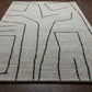 Abbey Valetta handwoven wool area rug with abstract design in neutral tones, perfect for modern home decor.
