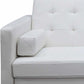 Close-up of 80" White Faux Leather Sleeper Sofa With Silver Legs showing plush armrest and white tufted upholstery.