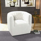 Delaney Tufted Swivel Barrel Chair – Modern Accent Chair (Multiple Colors & Fabrics) in a stylish indoor setting.