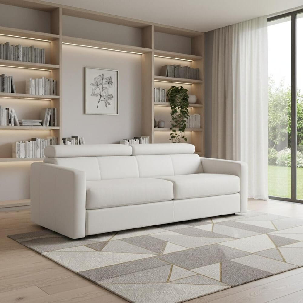81" White Leather Sleeper Sofa in modern living room with geometric rug and bookshelves.