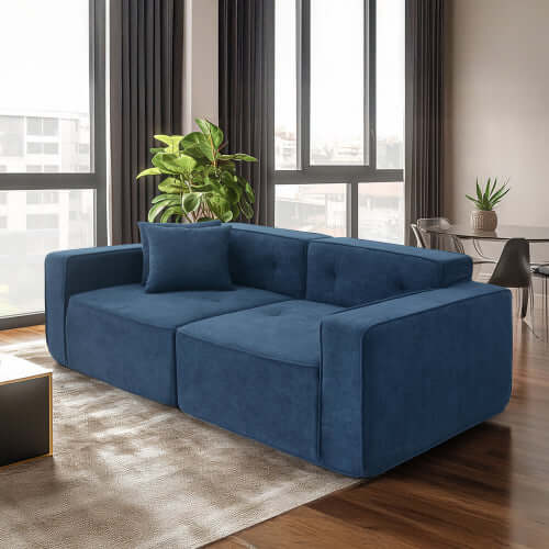 Modern low profile box arm memory foam sofa in blue, featuring ergonomic design and mattress-level comfort.