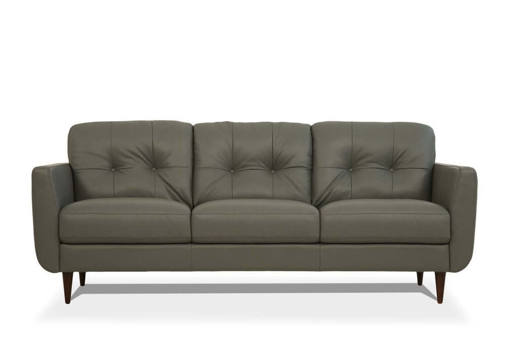 83" Green Leather Sofa With Black Legs featuring soft leather and stylish tufted design.
