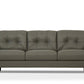 83" Green Leather Sofa With Black Legs featuring plush tufted seating and elegant design.