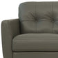 Close-up of the 83" Green Leather Sofa With Black Legs showcasing buttery soft leather and stylish tufted design.